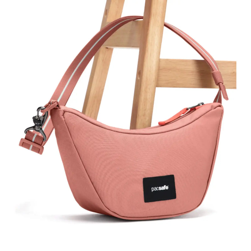 Cut-resistant anchor strap secures around a fixed object to protect your bag