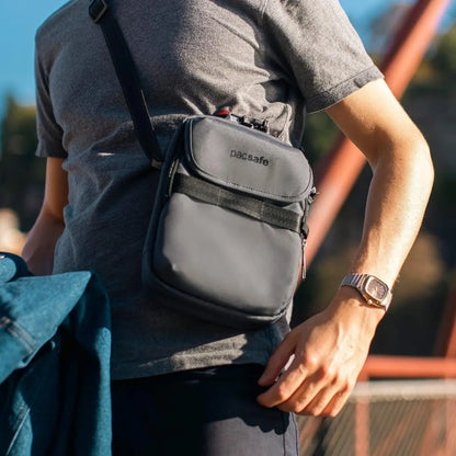 Man carrying Pacsafe Metrosafe X Crossbody Bag