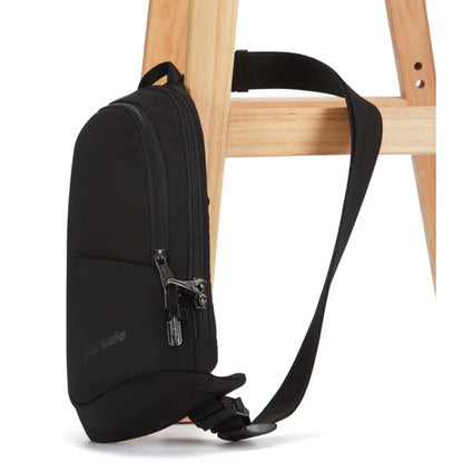 Cut-resistant anchor strap locks around a fixed object to protect your bag