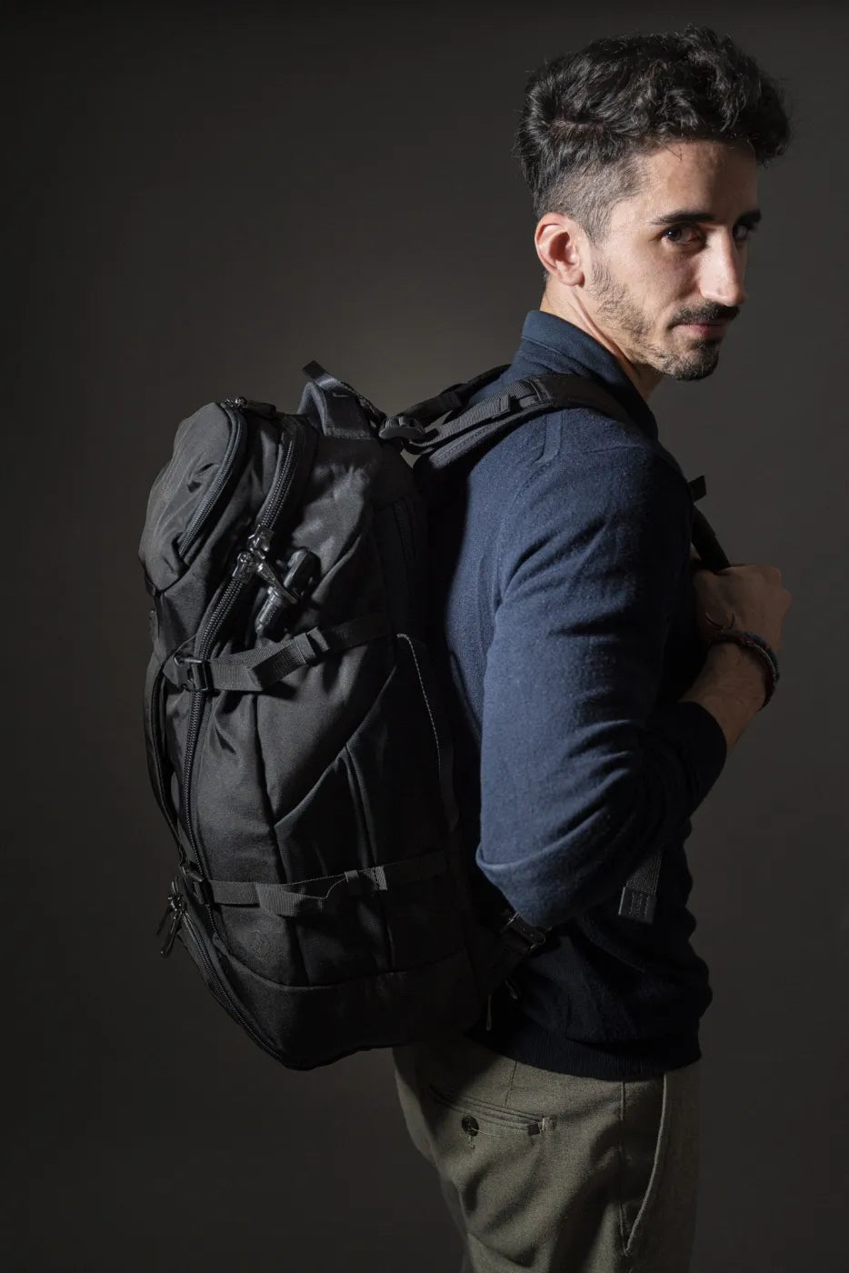 Venturesafe EXP35 35L Travel Backpack - Black in use