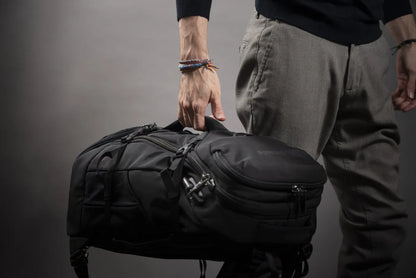 Venturesafe EXP35 35L Travel Backpack - Black in use