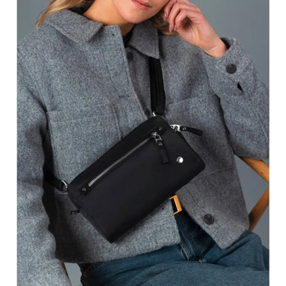 Can be worn 3 different ways, as a crossbody, sling pack or clutch