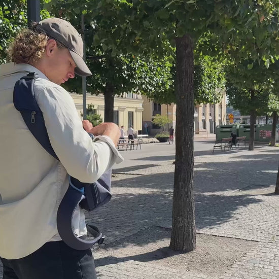 Pacsafe V Commuter 18L Anti-Theft 16" Laptop Backpack - Ocean product video