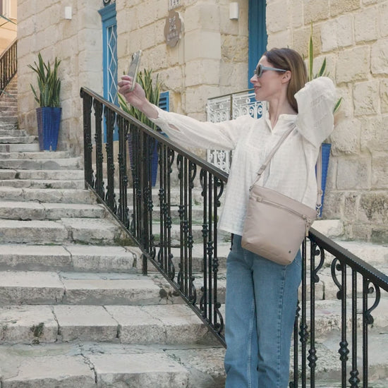 Pacsafe W Anti-theft Crossbody Bag - Taupe product video