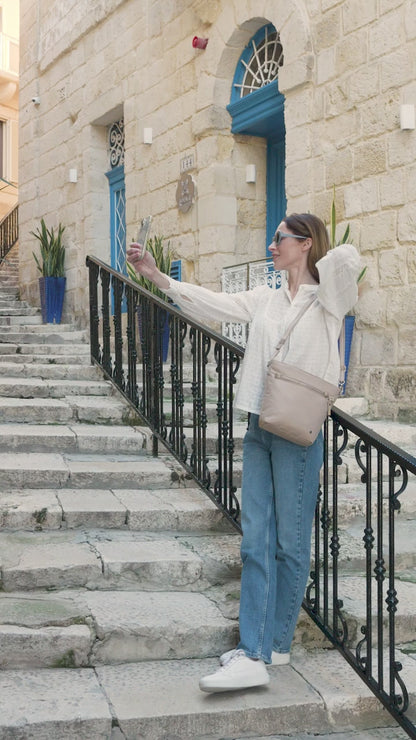 Pacsafe W Anti-theft Crossbody Bag - Taupe product video