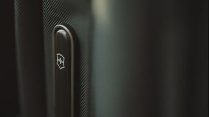 Victorinox Werks Traveler 7.0 boarding backpack in black carried by a traveller from a hotel room into a car, a train and a meeting room