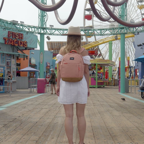 Pacsafe GO 15L Anti-Theft 13" Laptop Backpack - Rose product video
