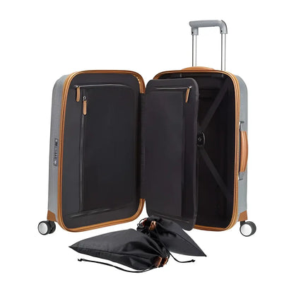 Functional elastic cross ribbons to secure packed items