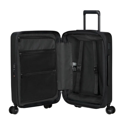 Packing straps for securing luggage and zipped divider with pockets