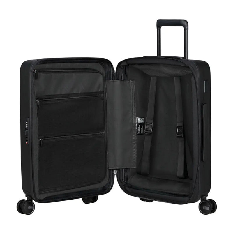 Packing straps for securing luggage and zipped divider with pockets