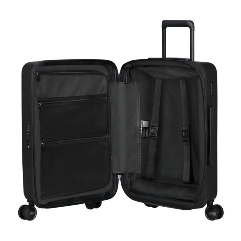 Packing straps for securing luggage and zipped divider with pockets