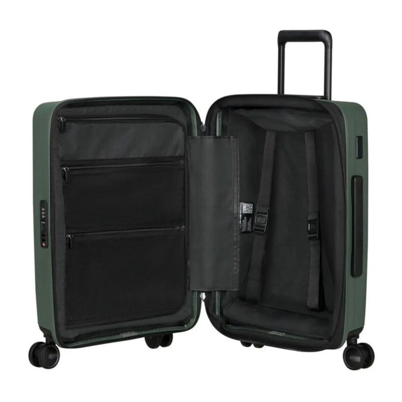 Packing straps for securing luggage and zipped divider with pockets