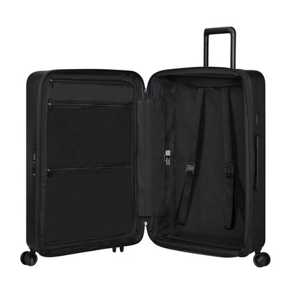 Packing straps for securing luggage and zipped divider with pockets