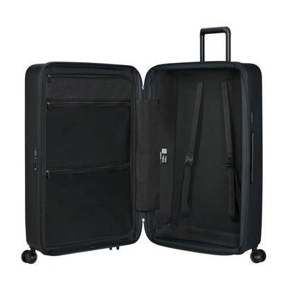 Packing straps for securing luggage and zipped divider with pockets