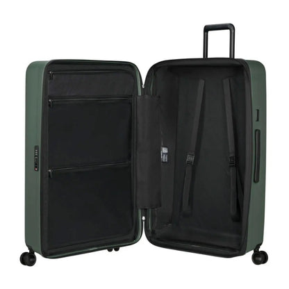 Packing straps for securing luggage and zipped divider with pockets