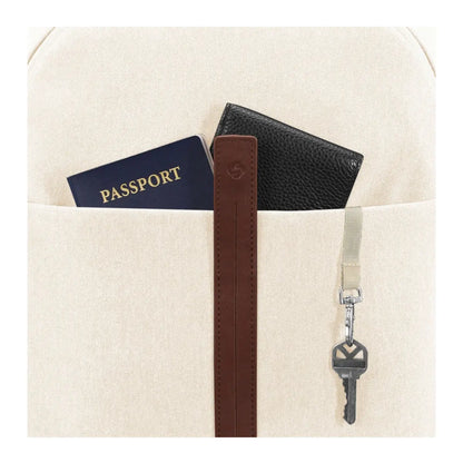 Exterior features front pocket and key fob with magnetic snap and zip closures