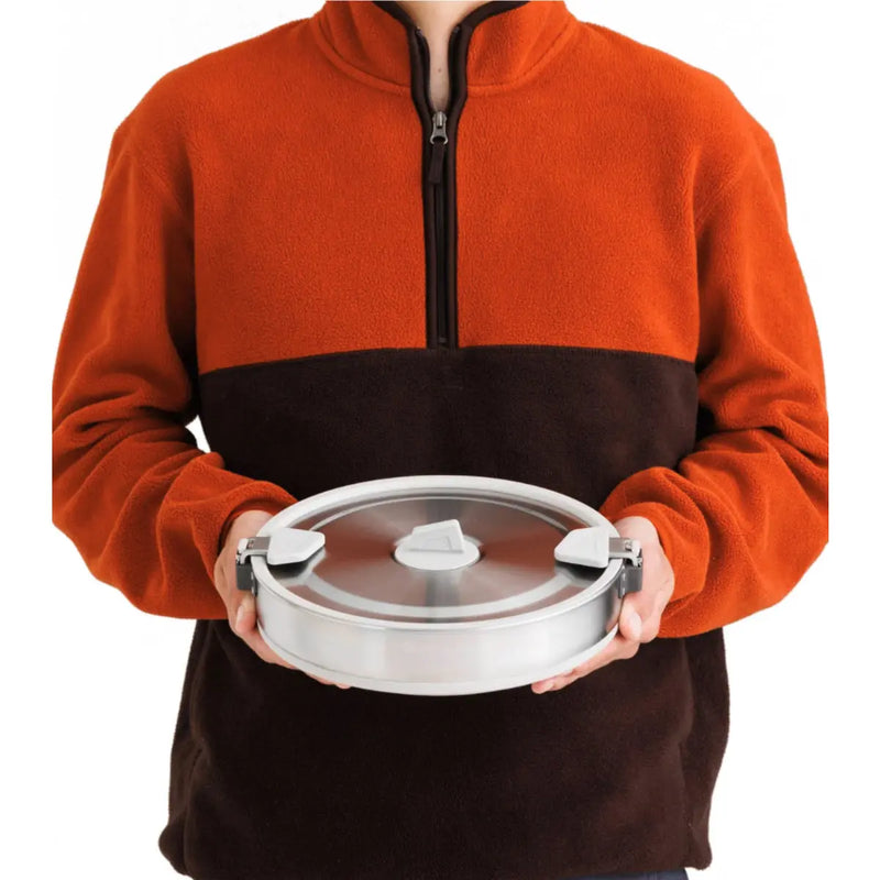 Dual Click-Safe handles allow you to securely hold, carry or pour from the pot, and can be reversed to secure the lid/contents for transport