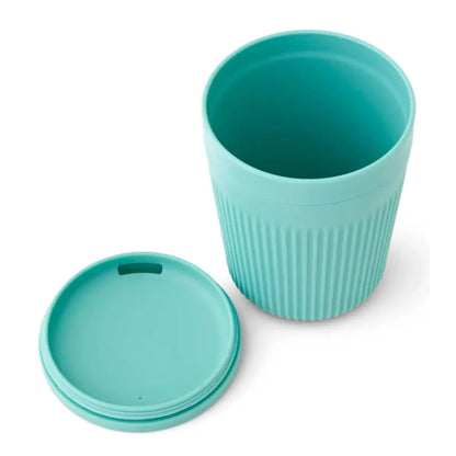 The silicone sipping lid conveniently folds inside the cup to save space