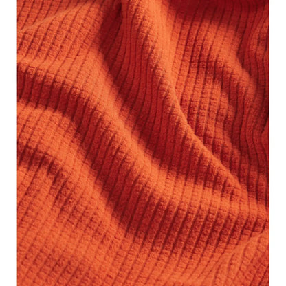 Hollow-core Thermolite® EcoMade fibres are used in a grid-pattern fleece for maximum warmth retention