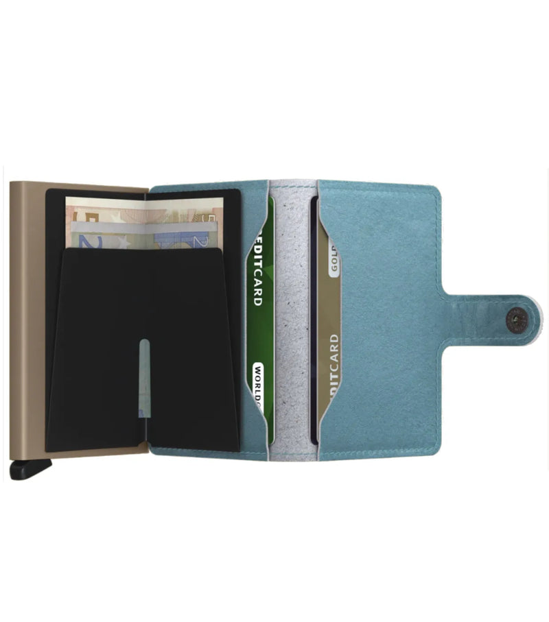 Includes two interior pockets for holding cards, notes, receipts, business cards and some coins
