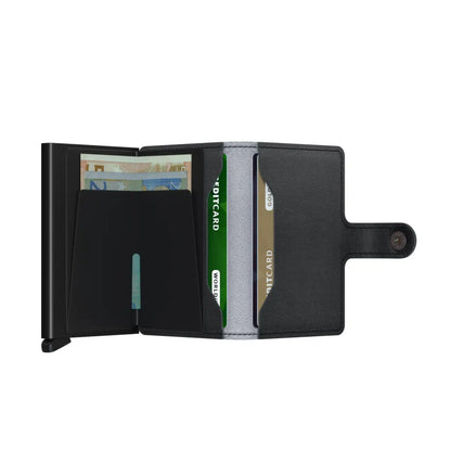 Includes two interior pockets for holding cards, notes, receipts, business cards and some coins