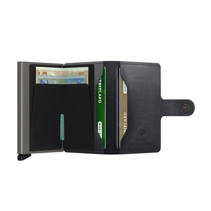 Includes two interior pockets for holding cards, notes, receipts, business cards and some coins