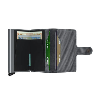 Includes two interior pockets for holding cards, notes, receipts, business cards and some coins