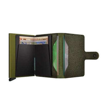 Includes two interior pockets for holding cards, notes, receipts, business cards and some coins