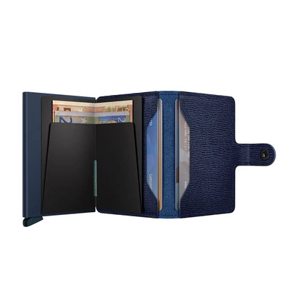Includes two interior pockets for holding cards, notes, receipts, business cards and some coins