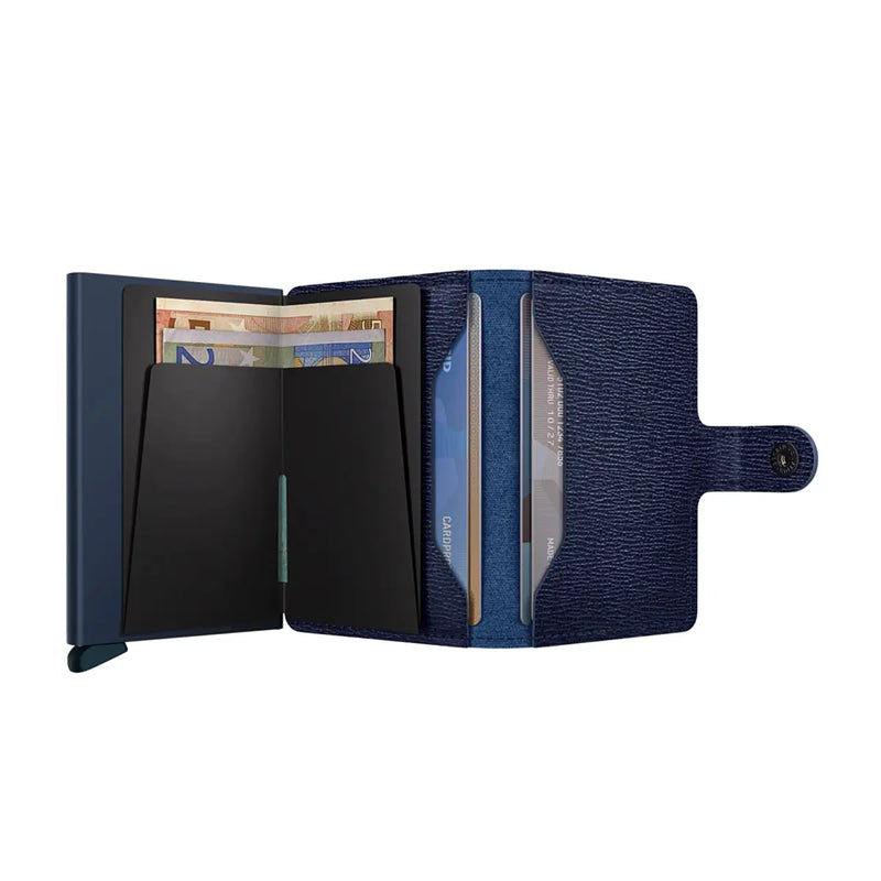 Includes two interior pockets for holding cards, notes, receipts, business cards and some coins
