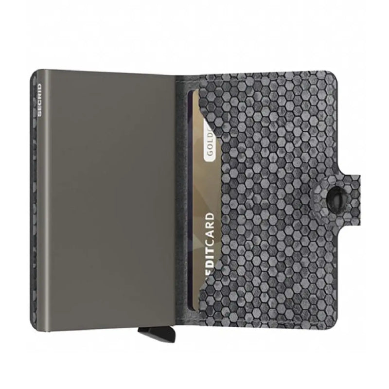 Includes two interior pockets for holding cards, notes, receipts, business cards and some coins