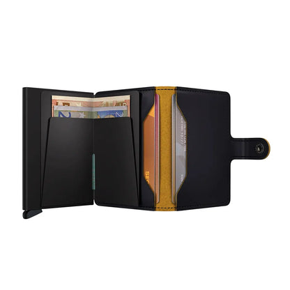 Includes two interior pockets for holding cards, notes, receipts, business cards and some coins