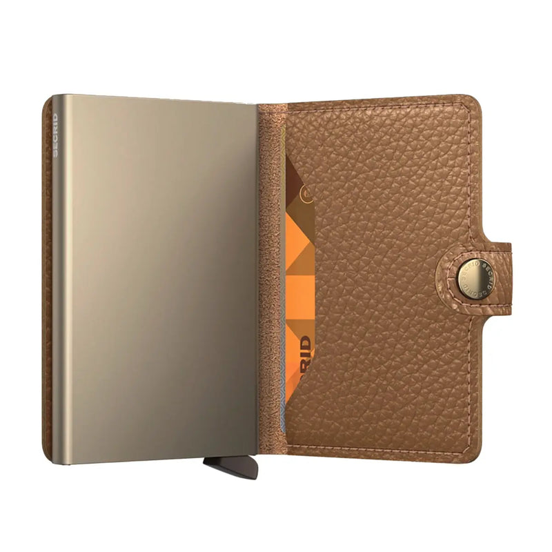 Embossed leather, with a pebble grain texture. 