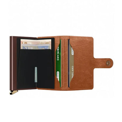 Includes two interior pockets for holding cards, notes, receipts, business cards and some coins