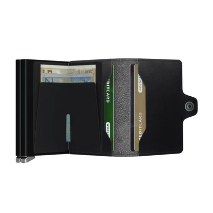 Dusk leather wallets are tanned by Tuscan leather artisans. La Bretagna, a family-owned business, is a pioneer in the sustainable production of vegetable-tanned leather. 