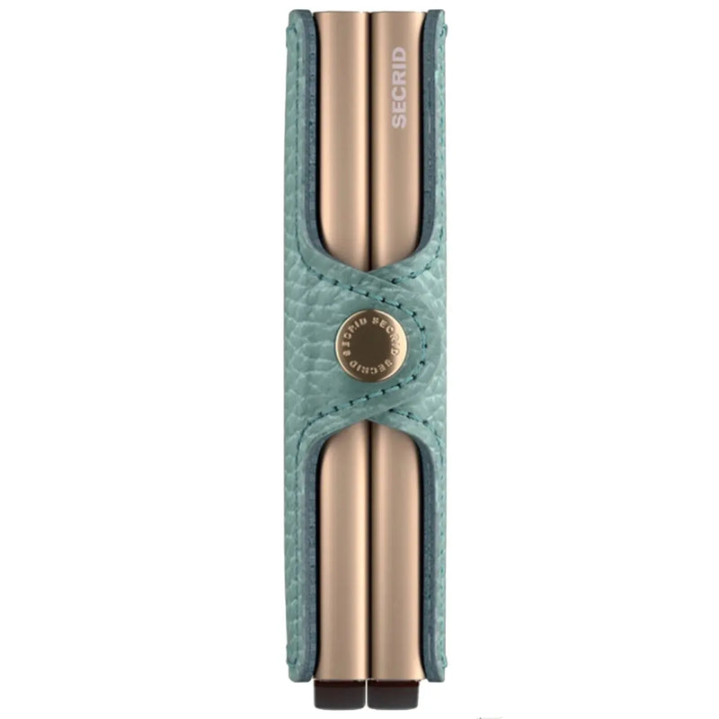 Made from aluminium and genuine leather with a press stud closure