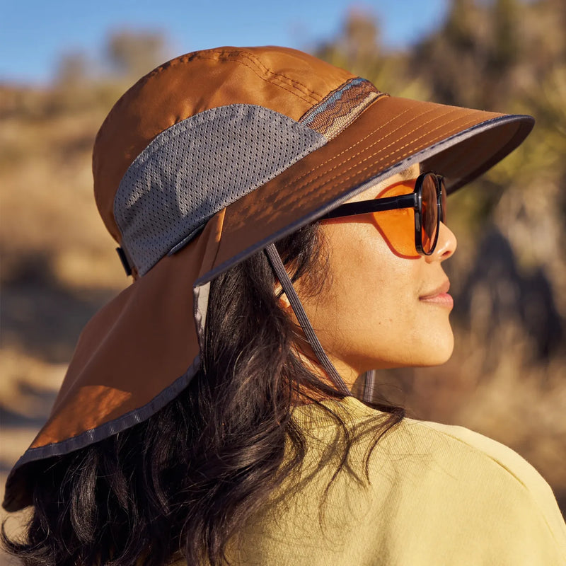 A woman wearing a Sunday Afternoons Adventure Hat in Canyon