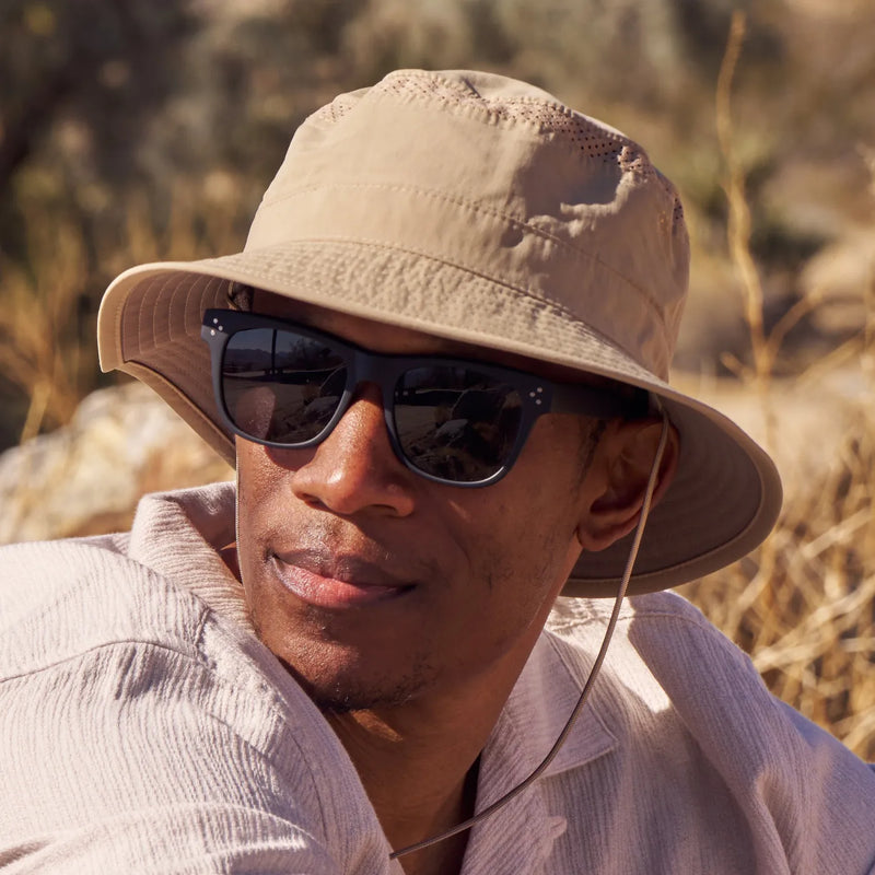 A Sunday Afternoons Solar Bucket Hat being worn outdoors