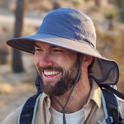 A man wearing a Sunday Afternoons Ultra Adventure Hat