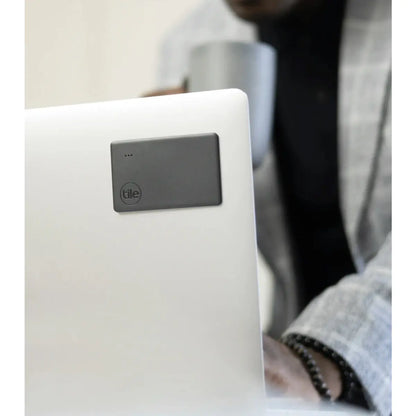 As thin as two credit cards so it lays flat on devices