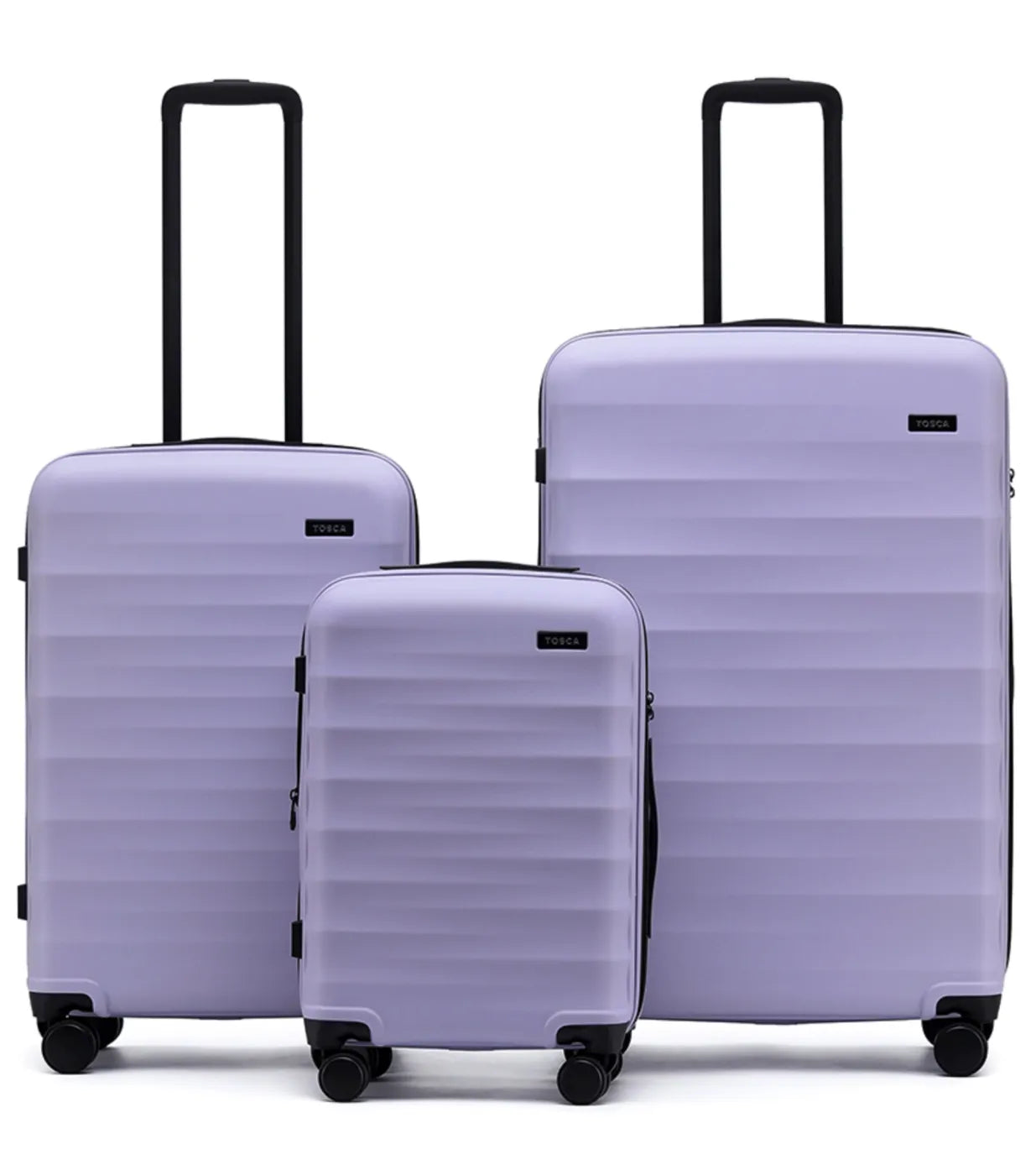 Set of three lavender tosco interstellar 2.0 hard-shell suitcases in three sizes with black handles and wheels