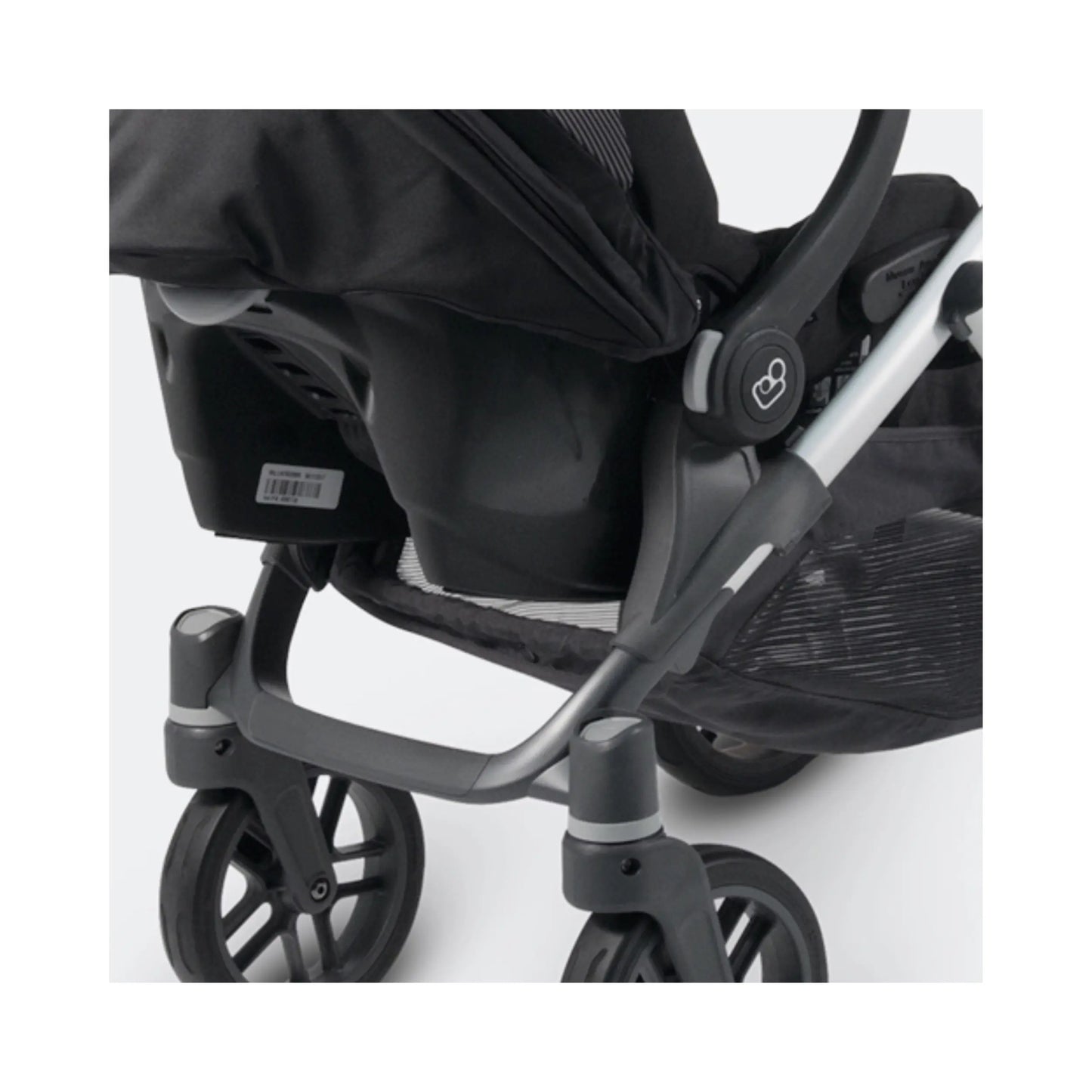 Stroller folds with the adapters on