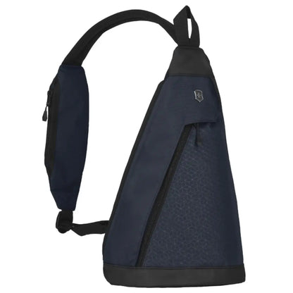 Zippered front compartment with snap cover contains an interior slash pocket