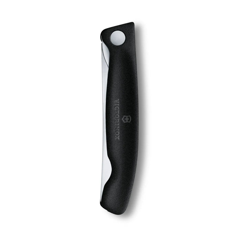 Victorinox Swiss Classic foldable paring knife in black, folded closed, front of the handle with the locking button