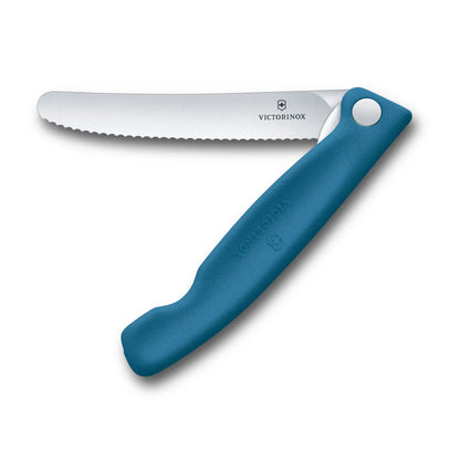 Victorinox Swiss Classic foldable paring knife in blueberry blue, opened flat with the 11 cm serrated blade extended, seen from above