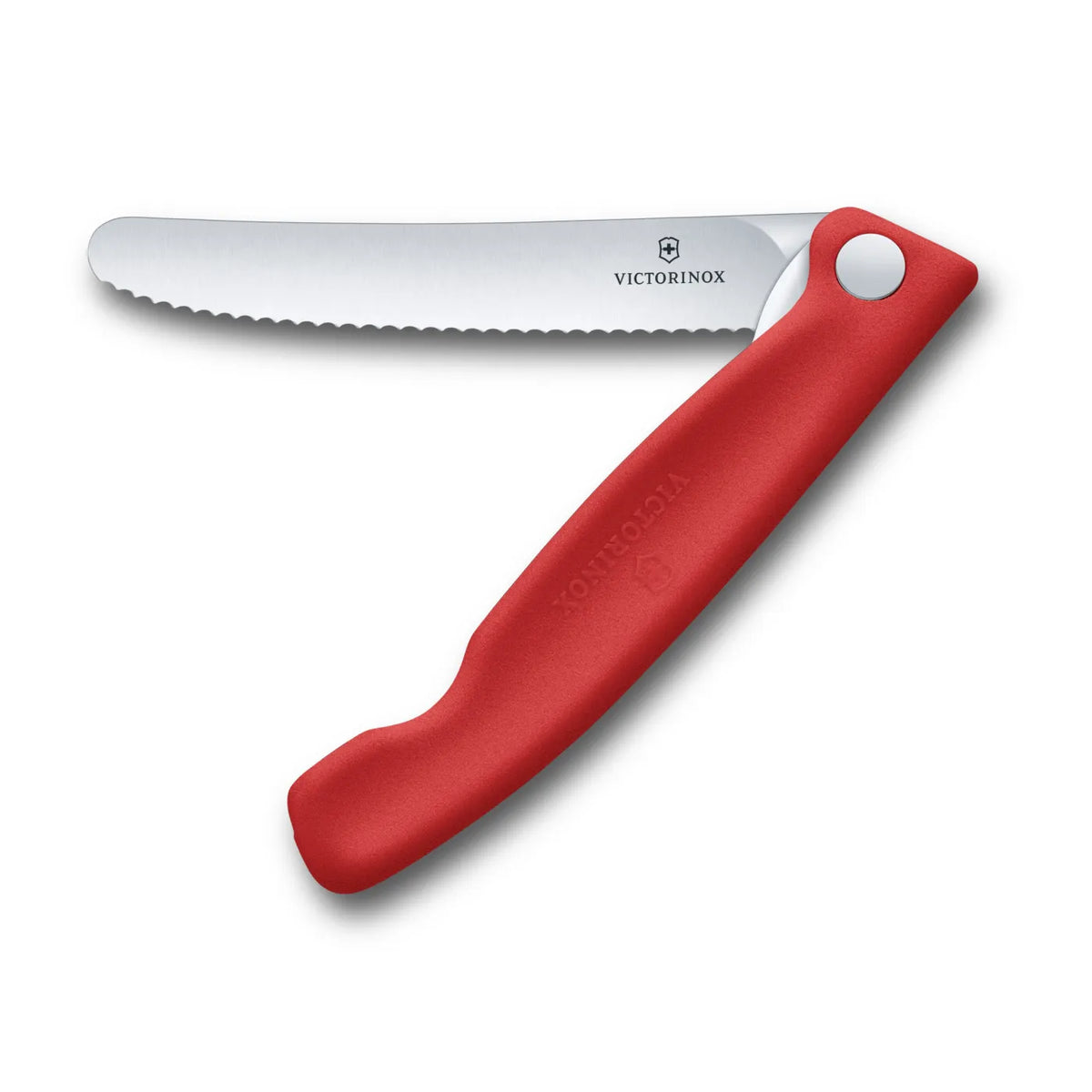 Victorinox Swiss Classic foldable paring knife in chilli red, opened flat with the 11 cm serrated blade extended, seen from above