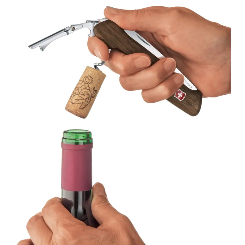 Unique combination tool houses a two-step lever for uncorking