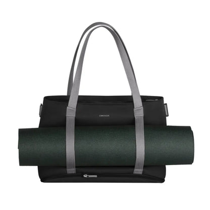 Outside straps can be used to carry a jacket / yoga mat