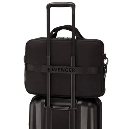 Pass-Thru trolley strap slides over wheeled luggage handles for easy travel with multiple bags