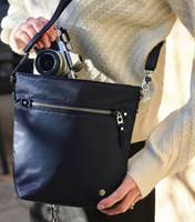 Where style meets security, this sleek anti-theft crossbody is the perfect companion for day-to-night use